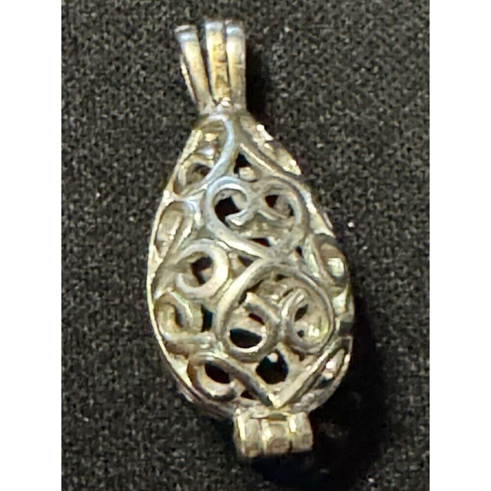 925 Sterling Silver Articulated Pendant. It Opens Completly